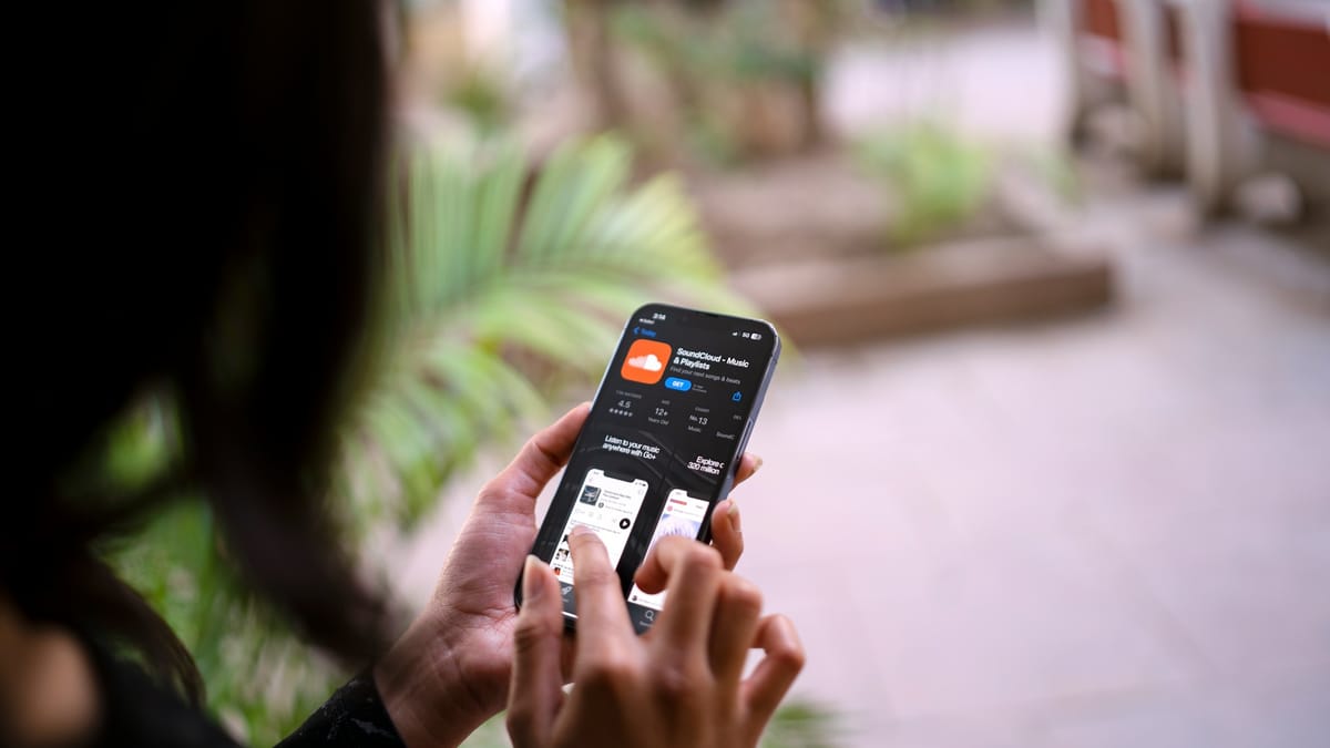 A woman holding a smartphone