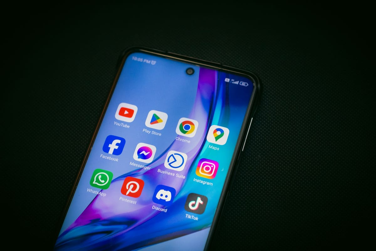 An Android phone screen glowing on a dark surface