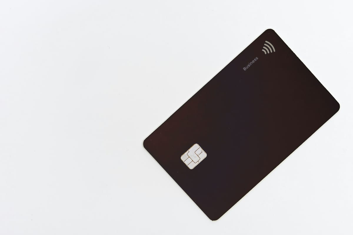 A black bank card with a chip