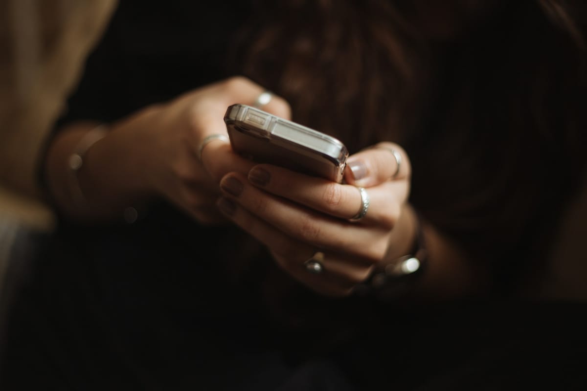 Hands holding a smartphone
