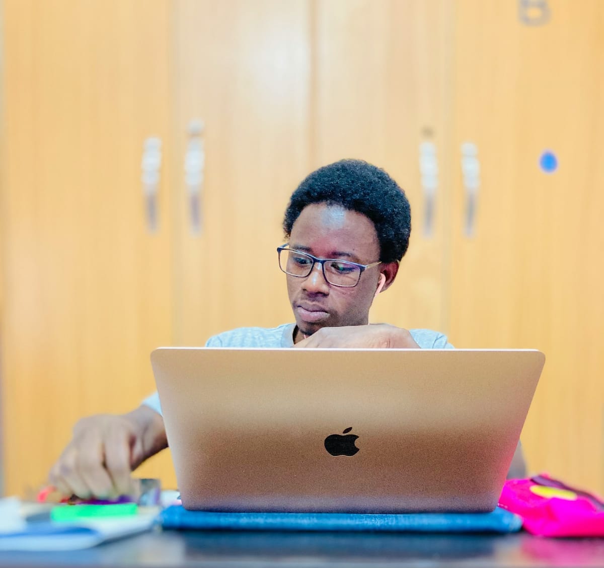 A man working on a laptop at a table