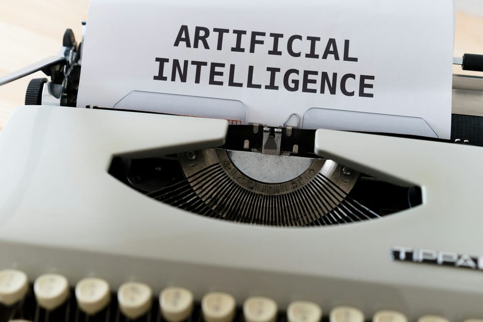 A typewriter with paper reading Artificial Intelligence